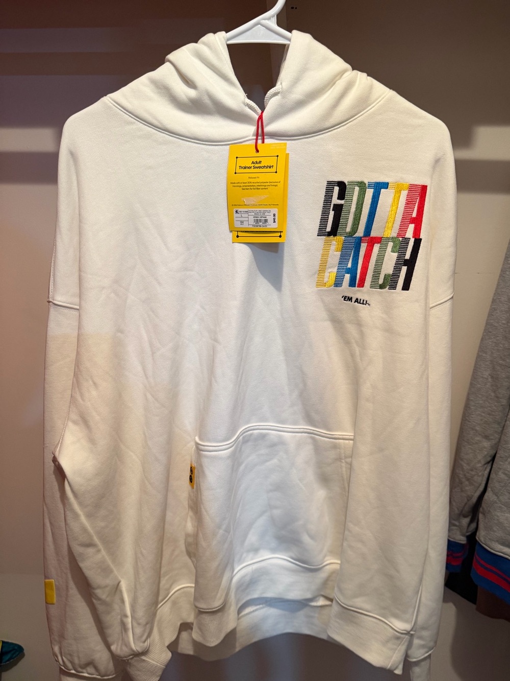 Pokemon White Hoodie with Multicolor "GOTTA CATCH" Chest Graphic